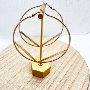 Large gold tone hoop triangle earrings